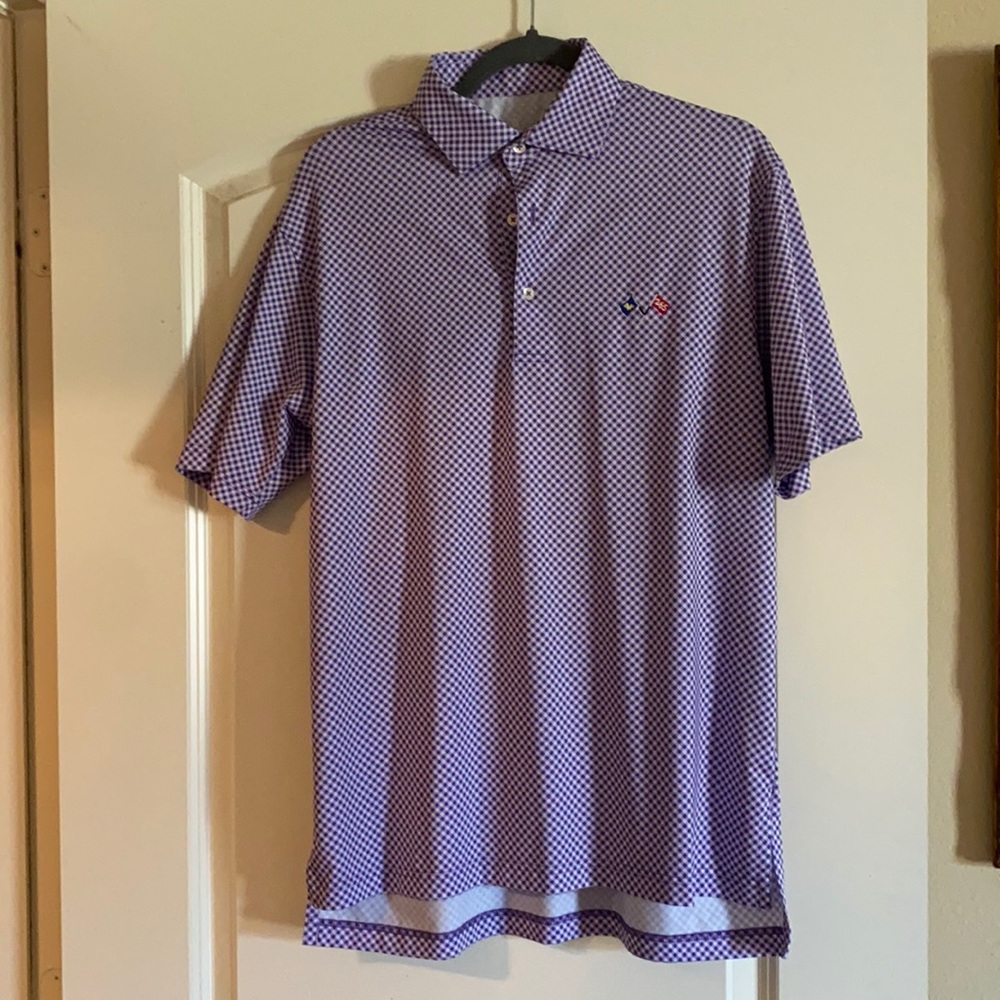 Men’s size s golf shirt. Like new condition.